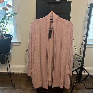 Ladies pink cardigan size M.